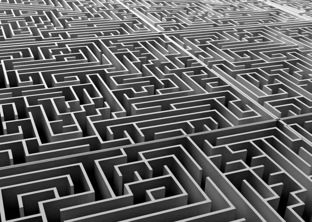 A complex maze symbolizes the feeling of being trapped and lost in obsessive thoughts and compulsive behaviors, highlighting the difficulty of breaking free from these mental patterns.